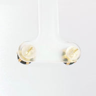 Luxury yellow gold earrings featuring natural black diamonds