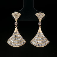 18k yellow gold dangle earrings with 1.20ct natural round and baguette diamonds