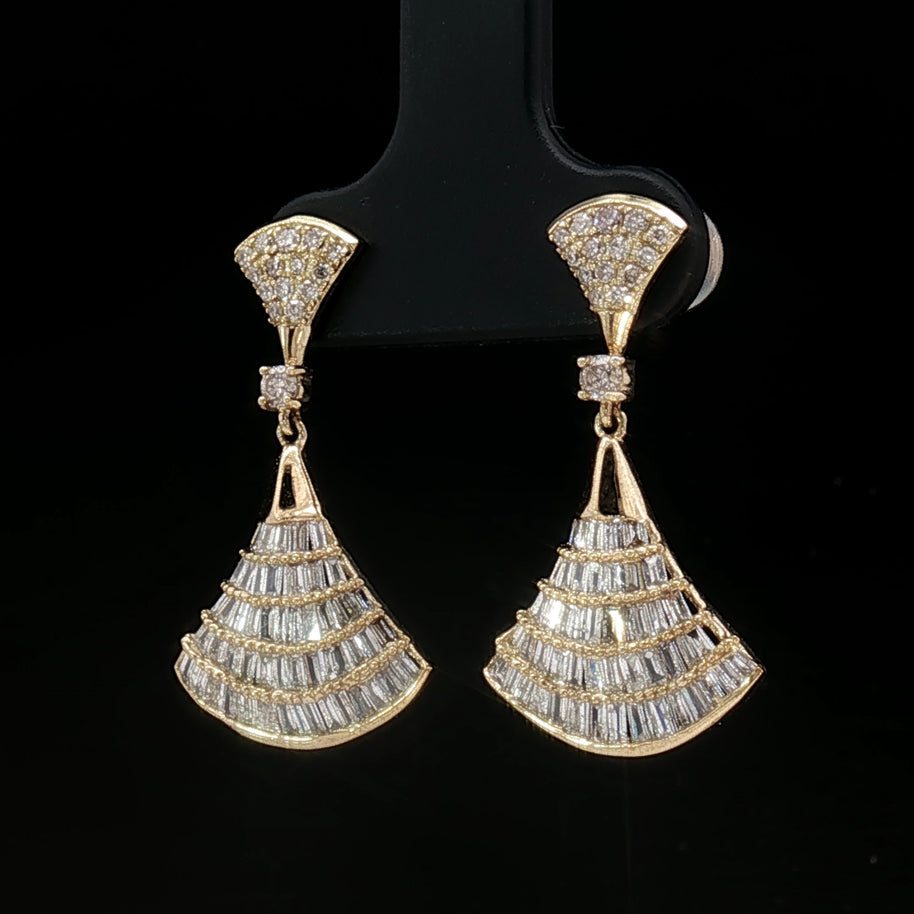 Side view of diamond dangle earrings in 18k yellow gold showing craftsmanship