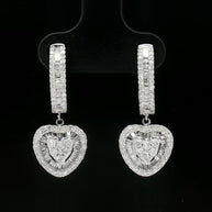 Side view of white gold diamond dangle earrings showing exquisite craftsmanship