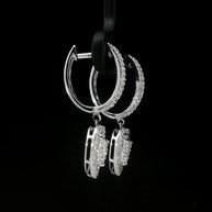 Elegant heart diamond earrings in 18k white gold with natural round and baguette diamonds