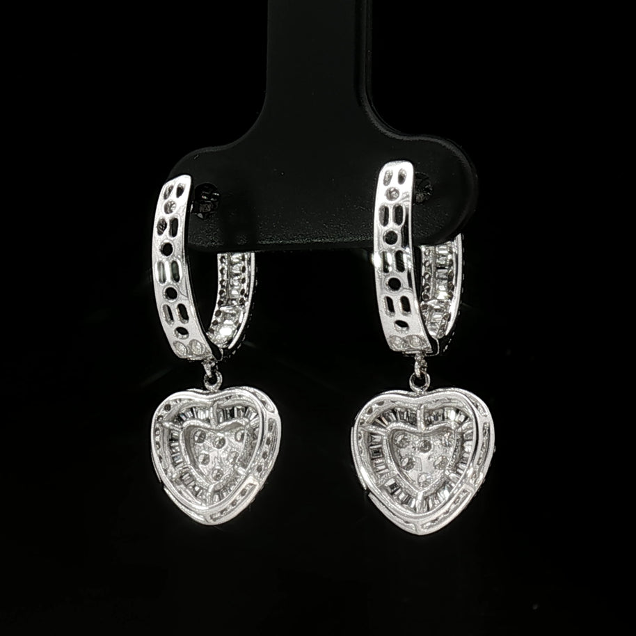 Pair of 18k white gold heart-shaped diamond earrings with sparkling natural stones