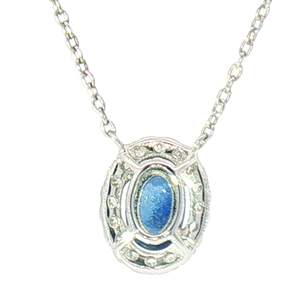 18k White Gold Charm Halo Necklace with 0.57ct Blue Sapphire and 0.11 tcw Natural Diamond