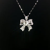 18k White Gold Ribbon Diamond Pendant – 0.80ct Natural Baguette & Round Brilliant Diamonds