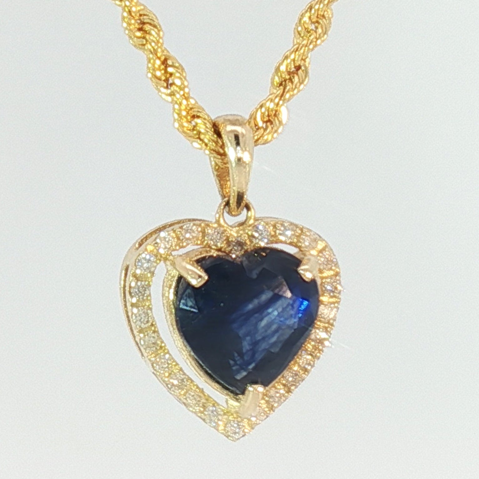 18k Yellow Gold Halo Heart Pendant with 2.50ct Blue Heart Sapphire and 0.12 tcw Natural Diamonds