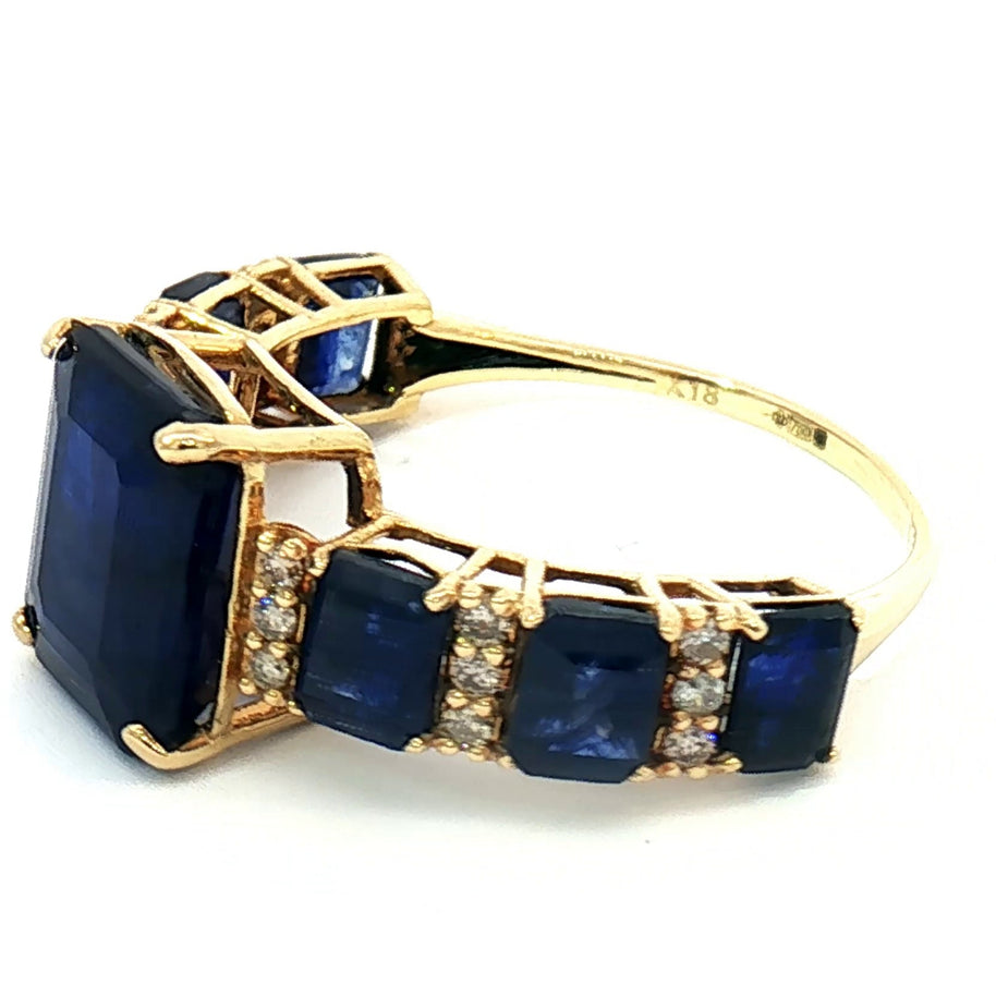 18k Yellow Gold Ring with 6.50tcw Blue Sapphire and 0.18tcw Natural Diamonds