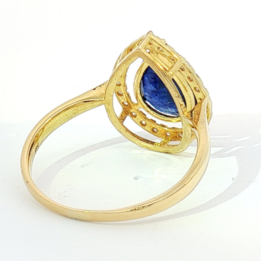 18k Yellow Gold Halo Cocktail Ring with 2.50ct Deep Blue Sapphire and 0.20tcw Natural Diamonds