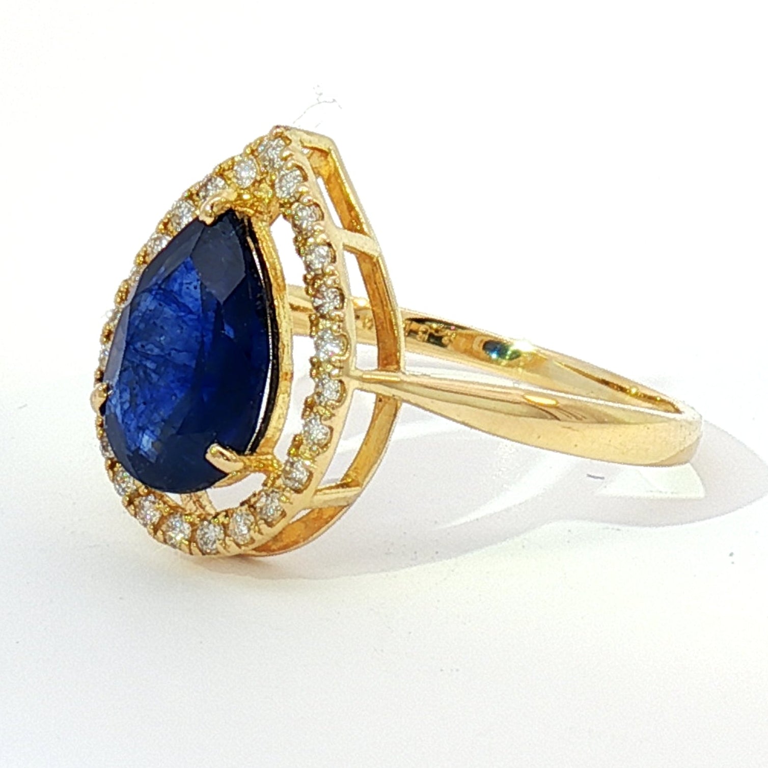 18k Yellow Gold Halo Cocktail Ring with 2.50ct Deep Blue Sapphire and 0.20tcw Natural Diamonds