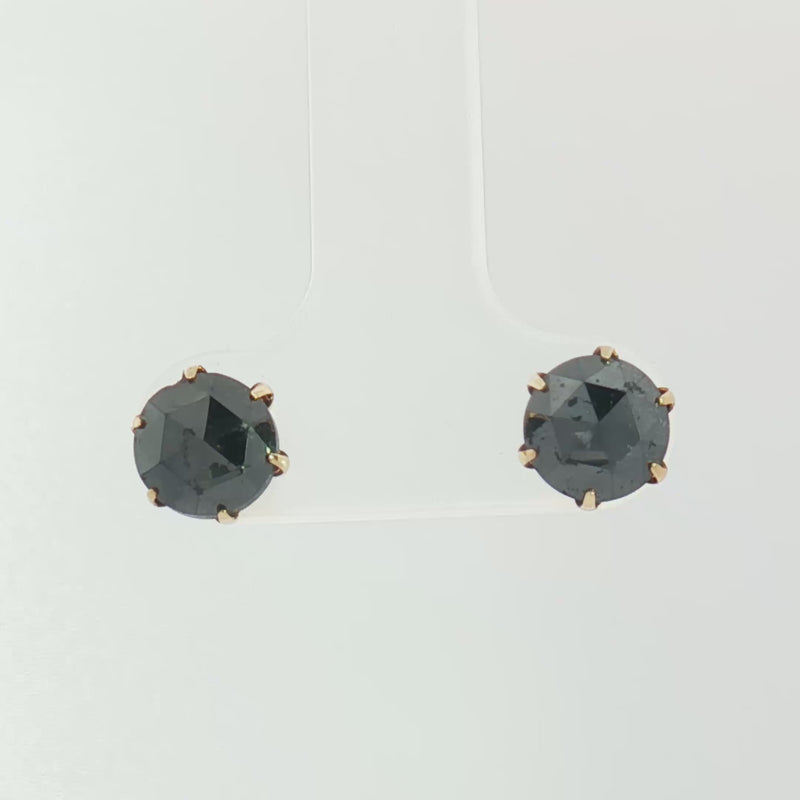 Pair of elegant black diamond studs in 18k gold